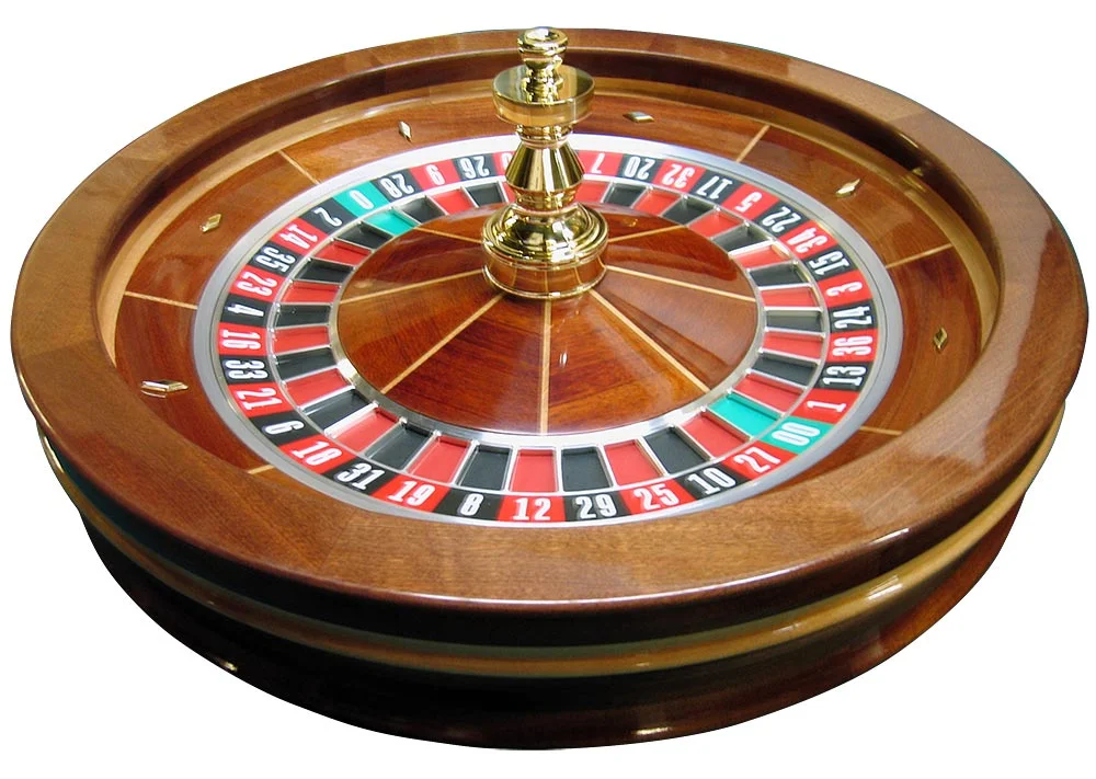 Ruleta de casino con números rojos negros y verdes girando